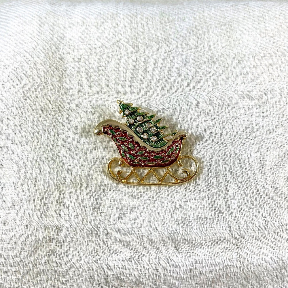 Vintage Christmas red sleigh and Christmas tree brooch. Excellent condition.